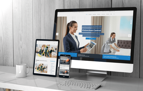 Das Bild zeigt die Website der Firma: "Visionclean" auf mehreren Geräten Ausgegeben