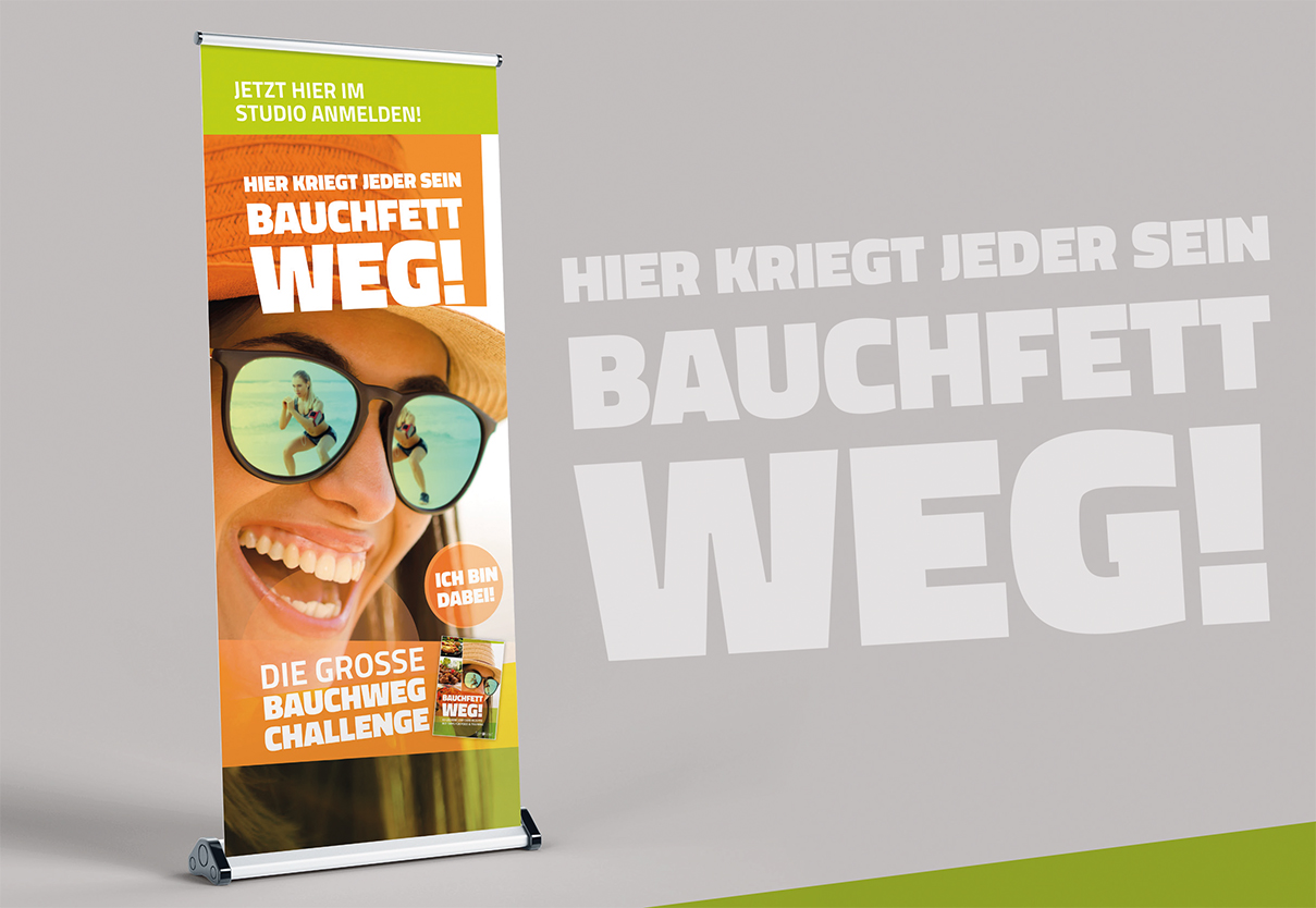 Bild eines Aufstellers der Firma Figurscout für die Kampagne Bauchfett weg